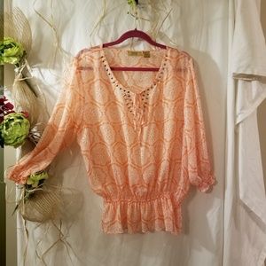 Beautiful peach and white floral blouse